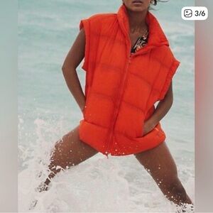 Free People Movement in a bubble Bright Orange Puffer Vest